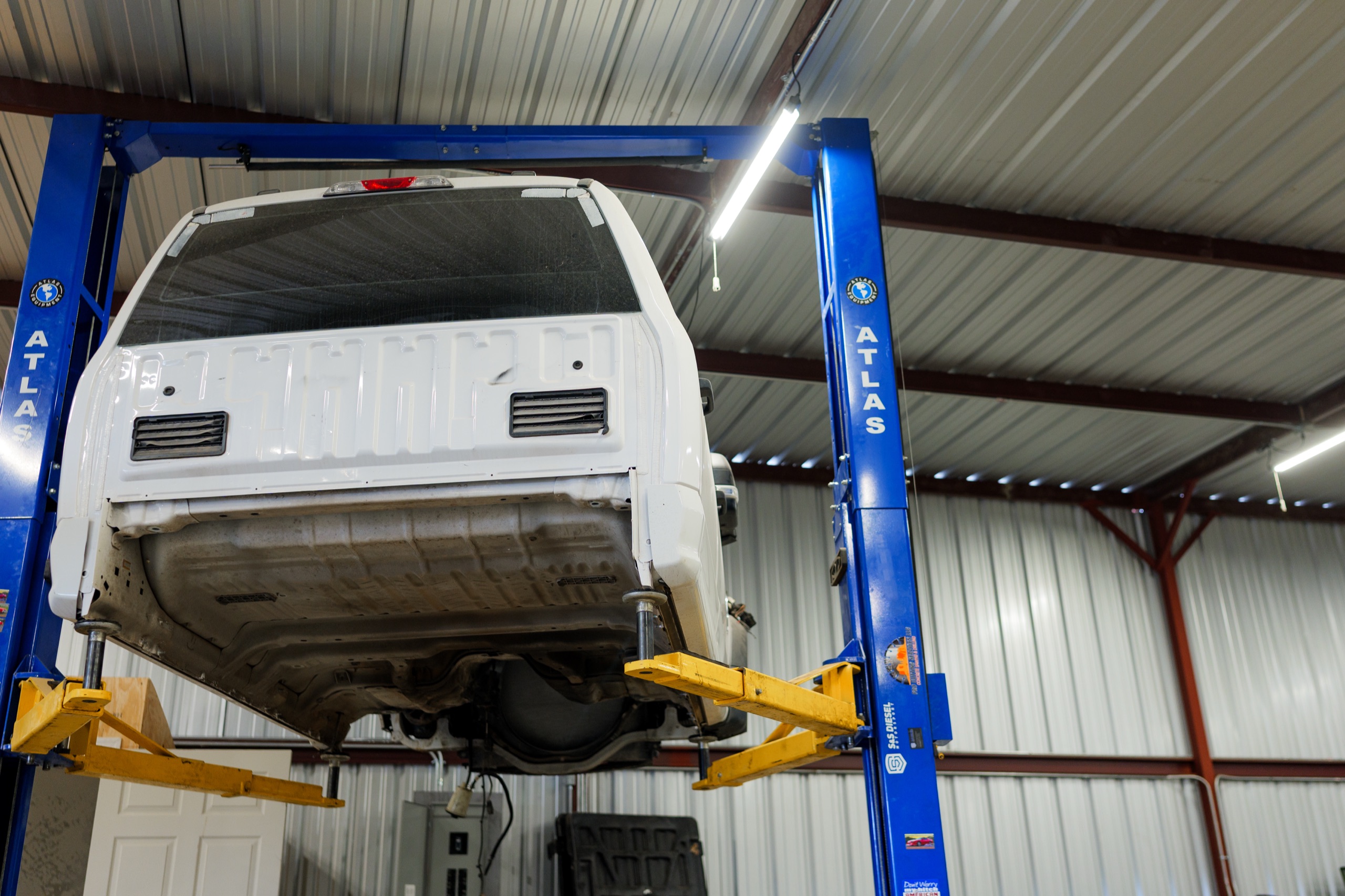 Diesel truck on the lift for transmission work at TES Phoenix